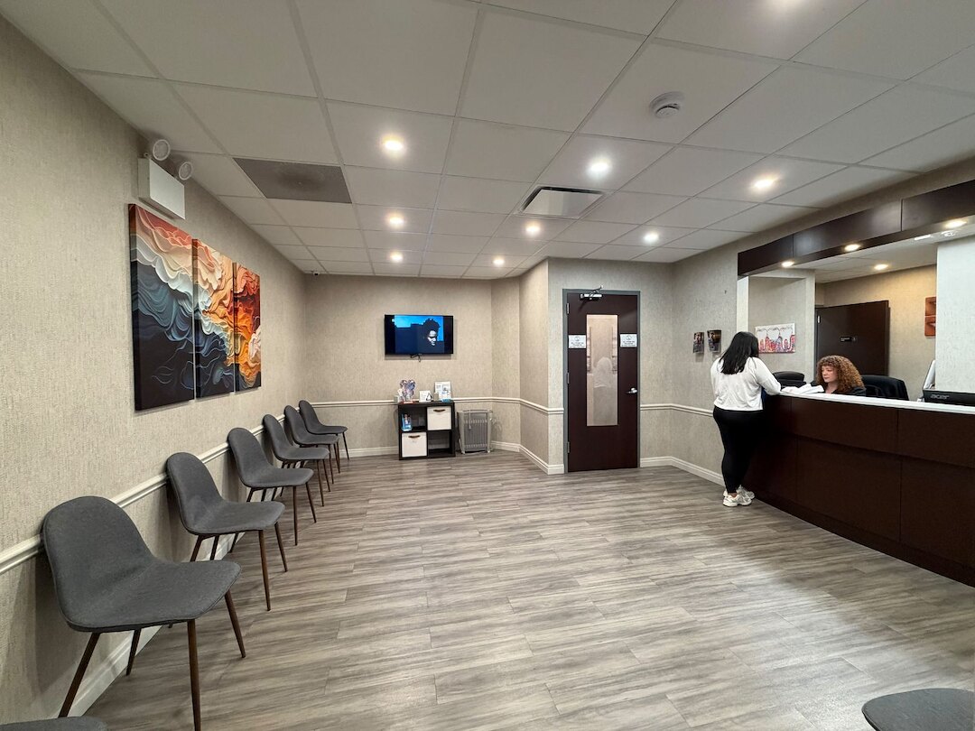 Reception and waiting area at Aesthetic Smile & Implant Studio in Dover, NJ
