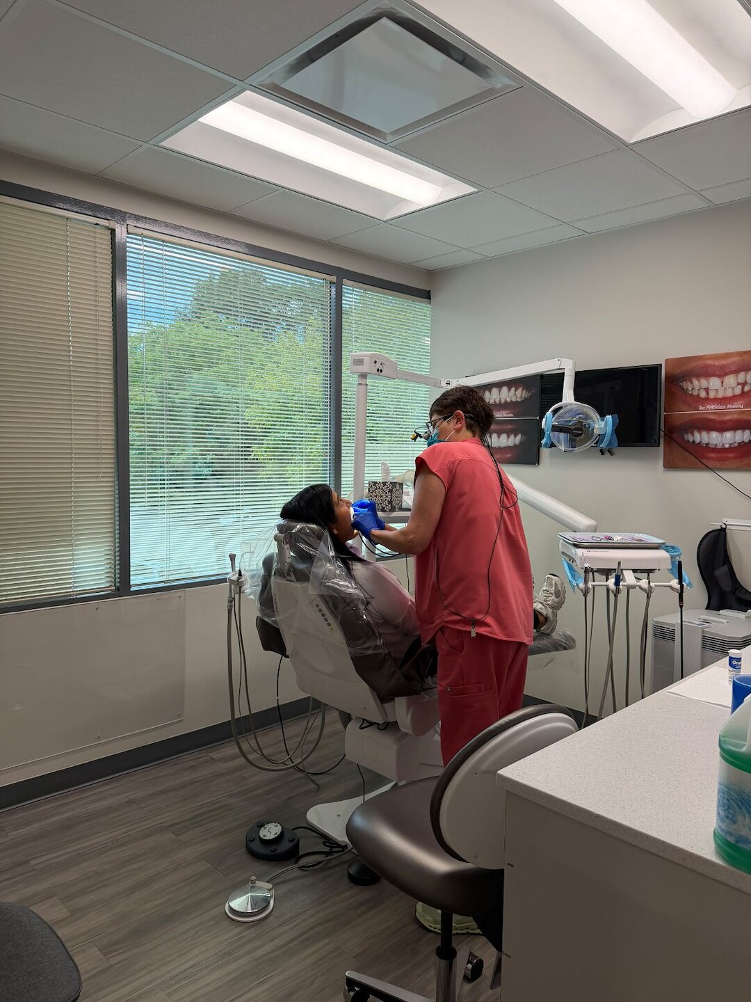 Dentist treating a patient at Aesthetic Smile & Implant Studio in Dover, NJ